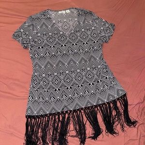 Black and white striped t-shirt blouse with tassel strings.